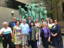 IHCC-NY, Inc. Board of Directors, join Comm. Joseph Sciame, President/Chair, in the presentation of award and flowers to Deputy Consul General Silvia Limoncini at th Mother Italy Statue at Poses Park, Hunter College, CUNY.